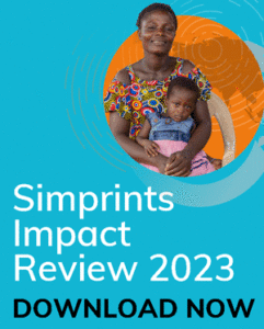 Cover of Simprints' Impact Review. Smiling lady holding a child